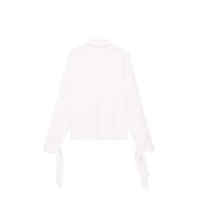 Blusa in crepe fluido con collo alto e laccetti 